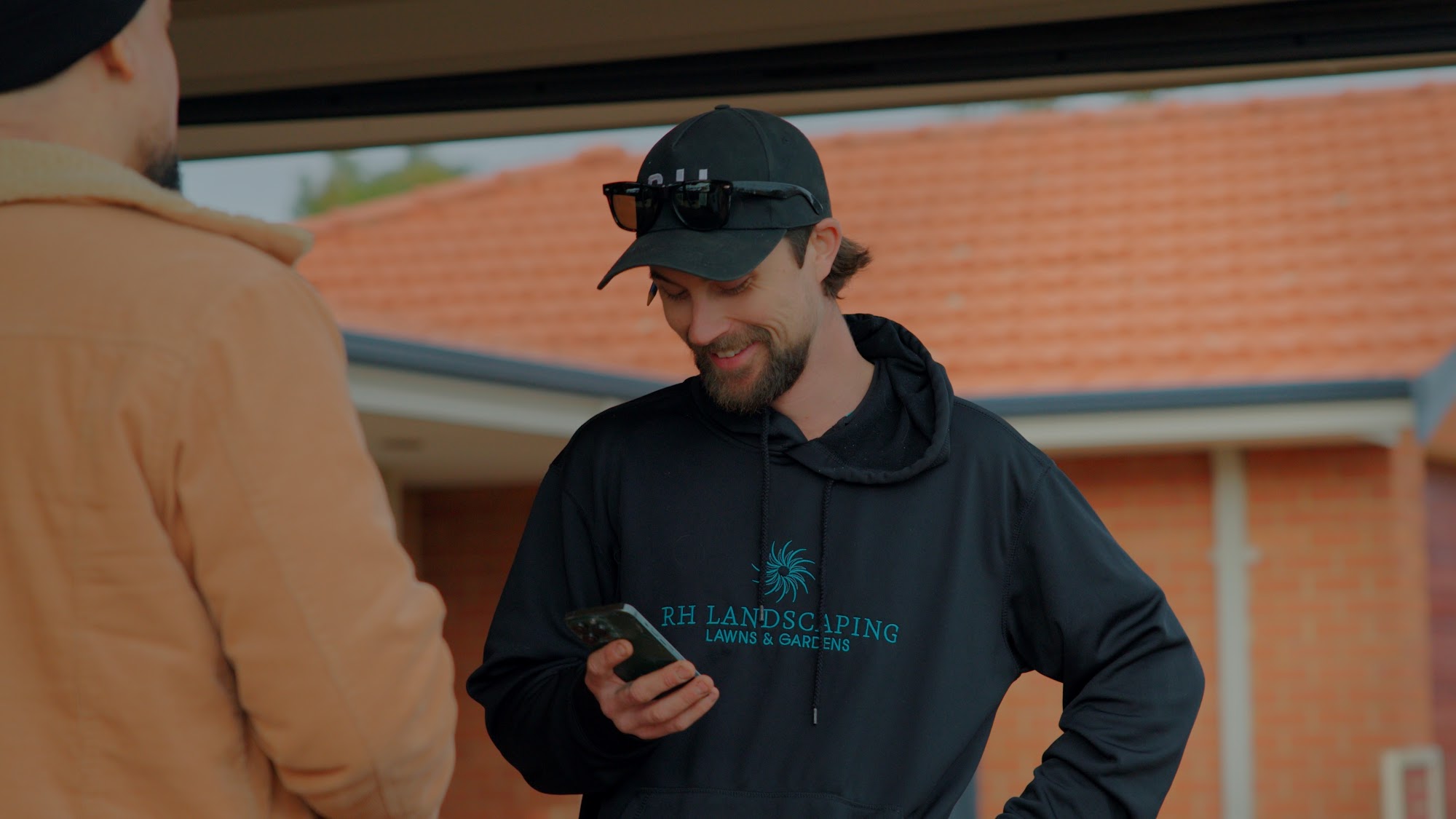 Khade, director of RH Landscaping, on site